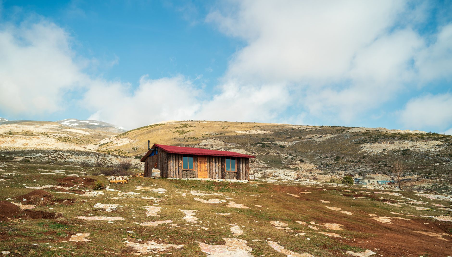 Travel writer documenting serene mountain lodge